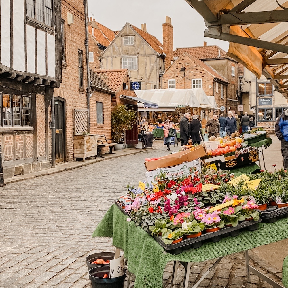 A Flower seller in Shambles Market
